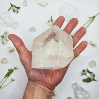 Clear quartz crystal - 482g on hand with crystals behind