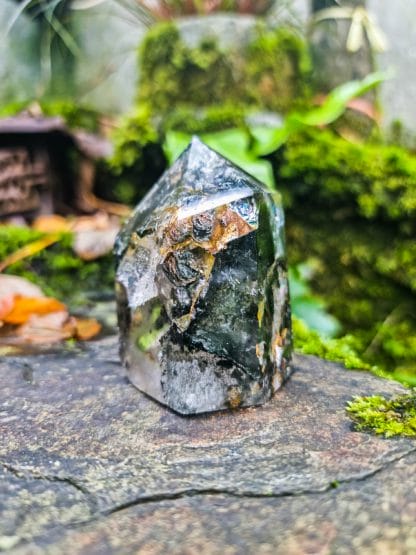 phantom quartz point with natural background - what is a crystal page